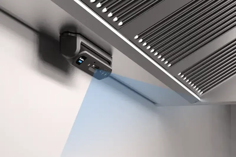 Safera FlowHero sensor unit under the exhaust hood.